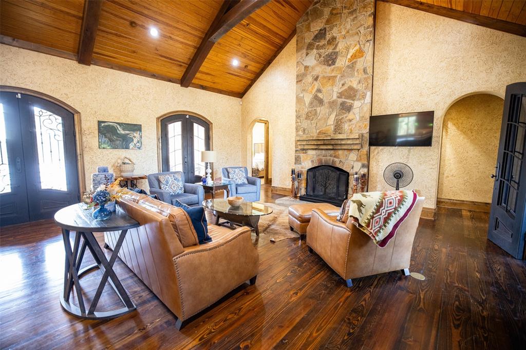450 Northeast Loop 7 Athens, TX 75751 - Photo 10 of 38 a living room with furniture a fireplace and a flat screen tv