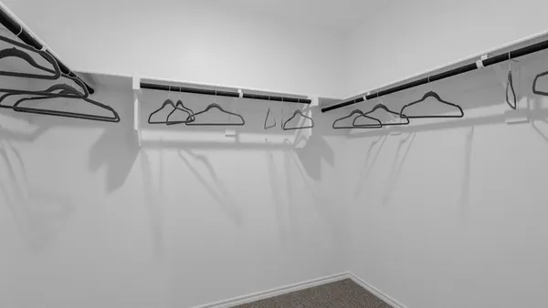 a view of a room with racks on the wall