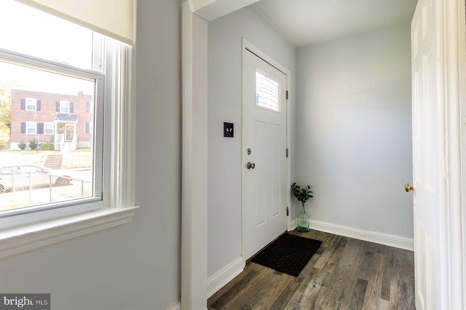 5318 Brookwood Road Baltimore, MD 21225 - Photo 5 of 34 Replaced front door and painted kitchen door.