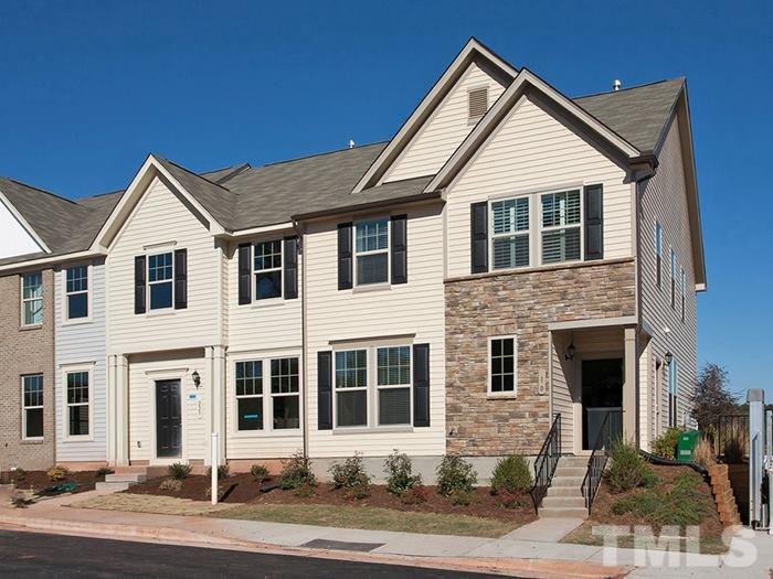 3003 Bluegrove Road Raleigh, NC 27610 - Photo 1 of 25 a front view of a house with a yard