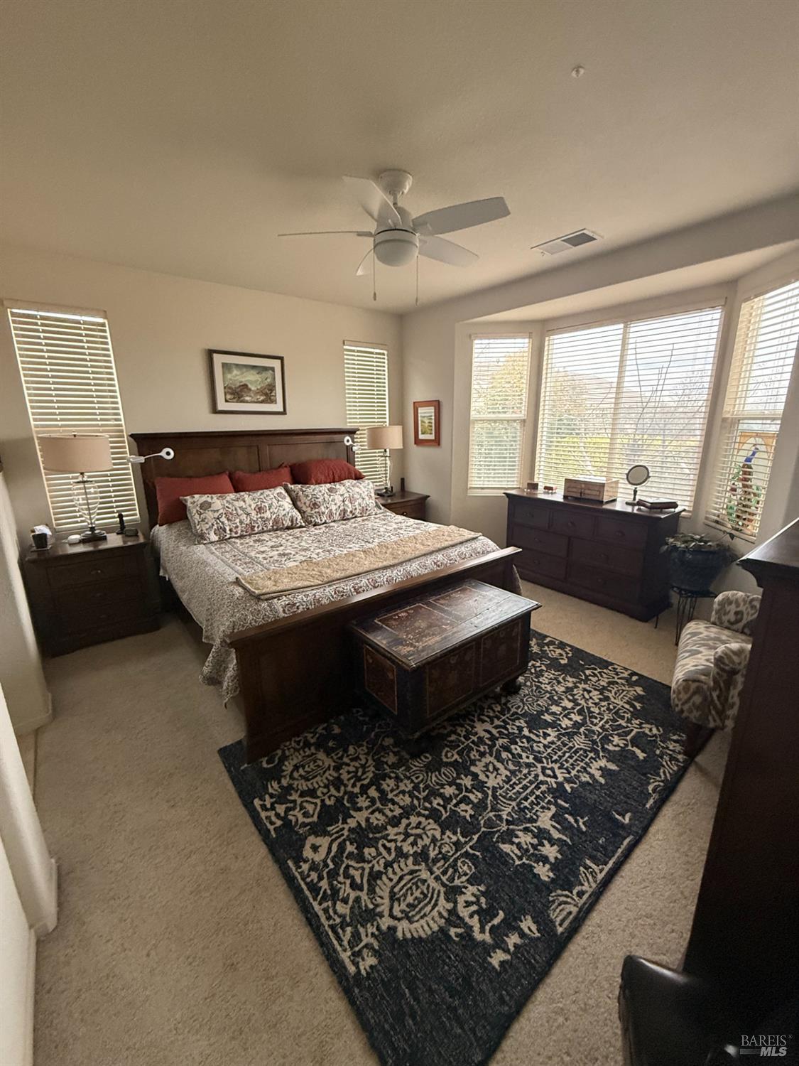 282 Cedar Ridge Drive Rio Vista, CA 94571 - Photo 4 of 8 a bed sitting in a bedroom next to a window