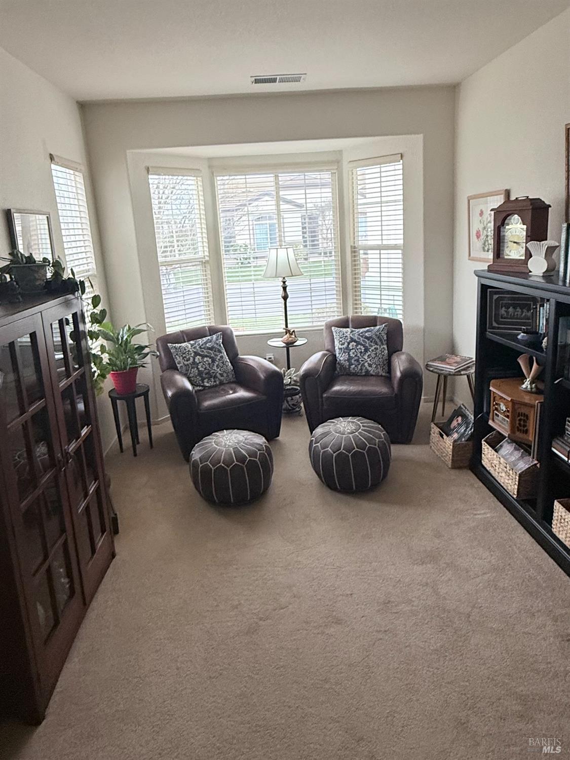 282 Cedar Ridge Drive Rio Vista, CA 94571 - Photo 5 of 8 a living room with furniture a couch and a flat tv screen next to a window