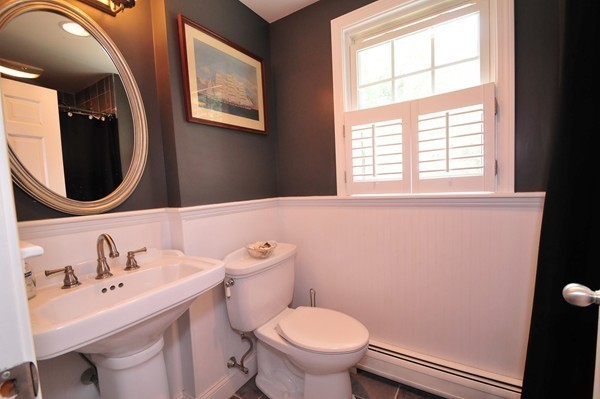 29 Johnson Road Sutton, MA 01590 - Photo 13 of 29 a bathroom with a toilet sink and mirror