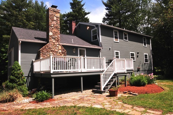 29 Johnson Road Sutton, MA 01590 - Photo 25 of 29 a front view of a house with a yard
