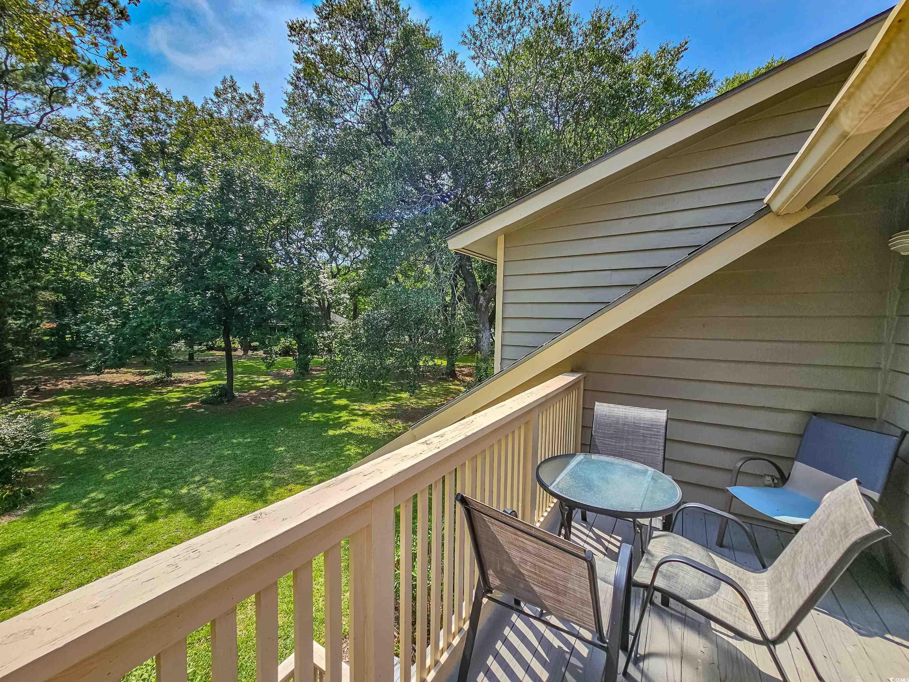 210 Westleton Drive, Unit 13D Myrtle Beach, SC 29572 - Photo 5 of 40 Wooden terrace with a lawn