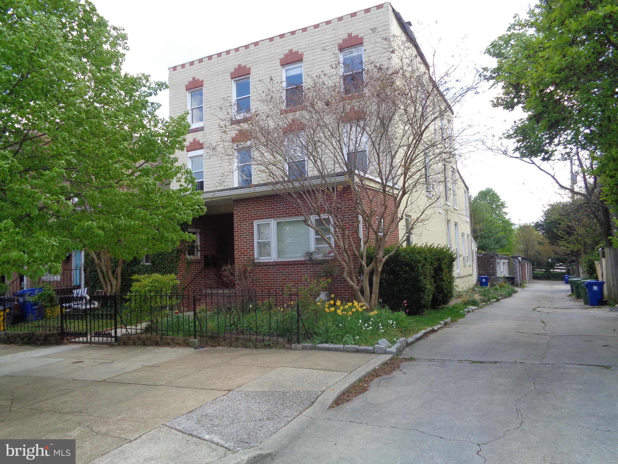 a view of a building with a street