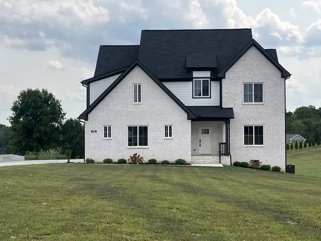 a front view of house with yard