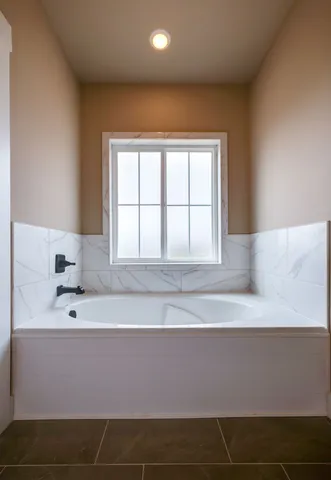 a bathroom with a bathtub