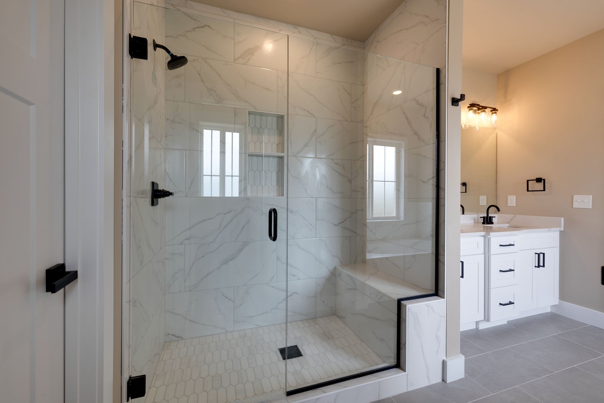 3010 Ora Lane Spring Hill, TN 37174 - Photo 18 of 33 a bathroom with a shower a mirror and a sink
