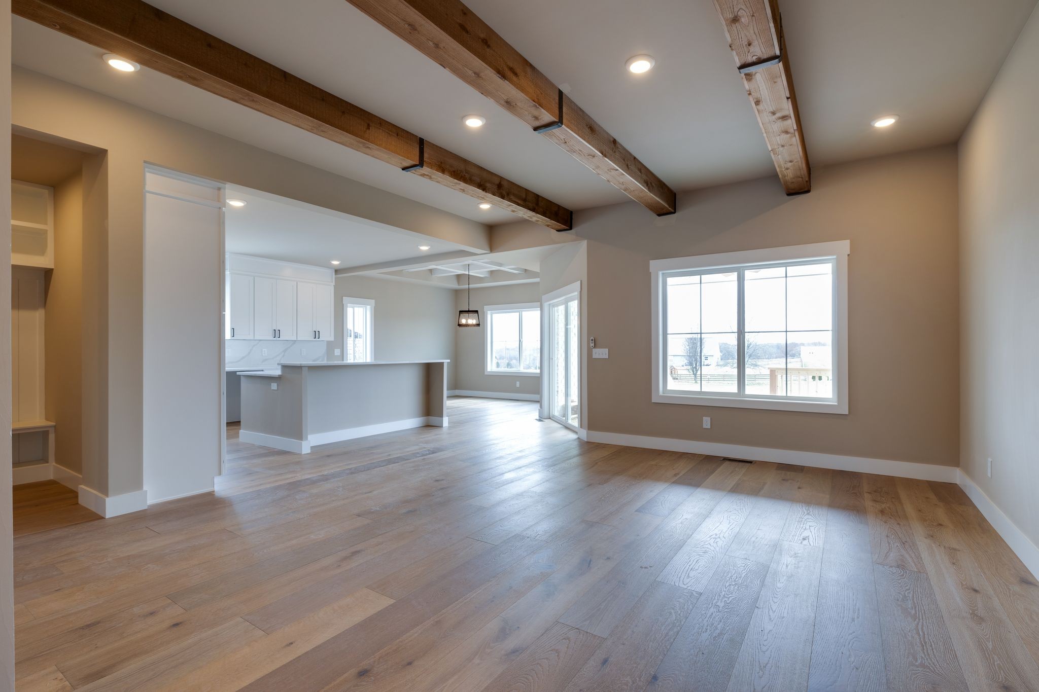 3010 Ora Lane Spring Hill, TN 37174 - Photo 7 of 33 a view of an empty room with wooden floor and a window