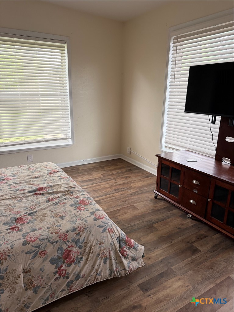 202 Bonham Street Port Lavaca, TX 77979 - Photo 10 of 11 a bedroom with a bed and a tv