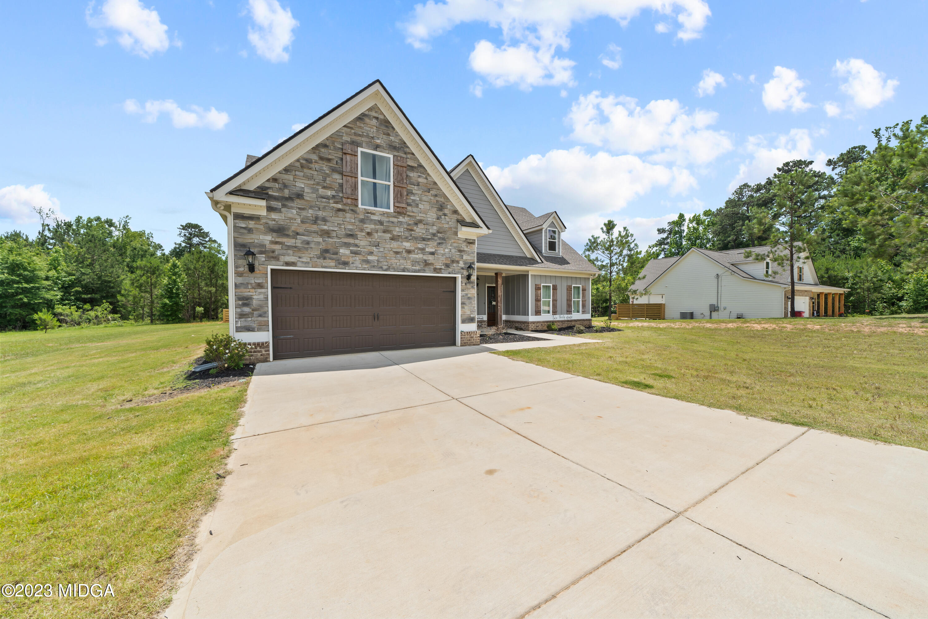 239 Davis Road Gray, GA 31032 - Photo 3 of 29 a front view of building with yard