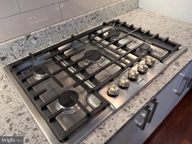 a view of cabinets with wooden floor