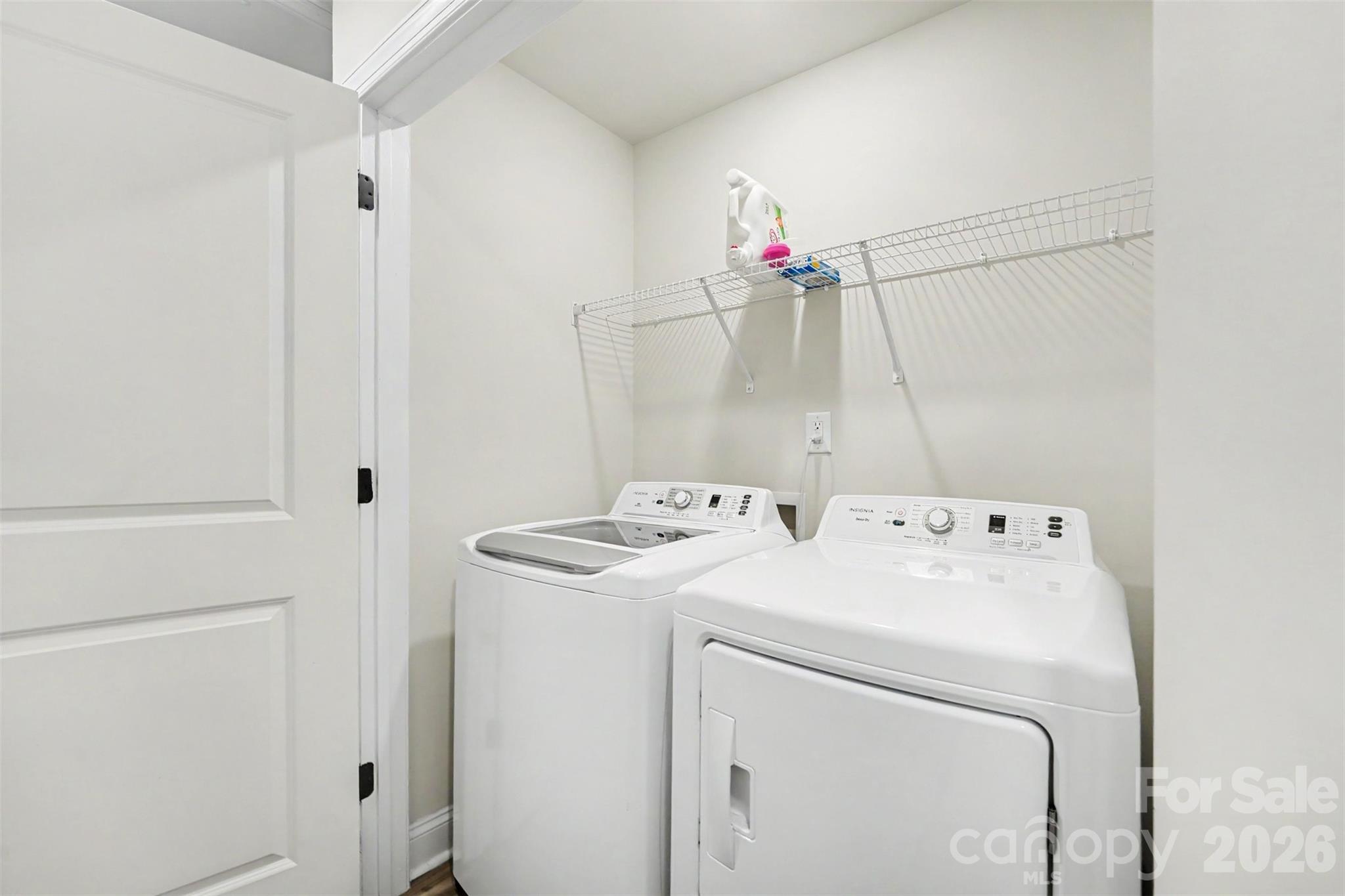 123 Brixham Loop Troutman, NC 28166 - Photo 17 of 18 a utility room with dryer and washer