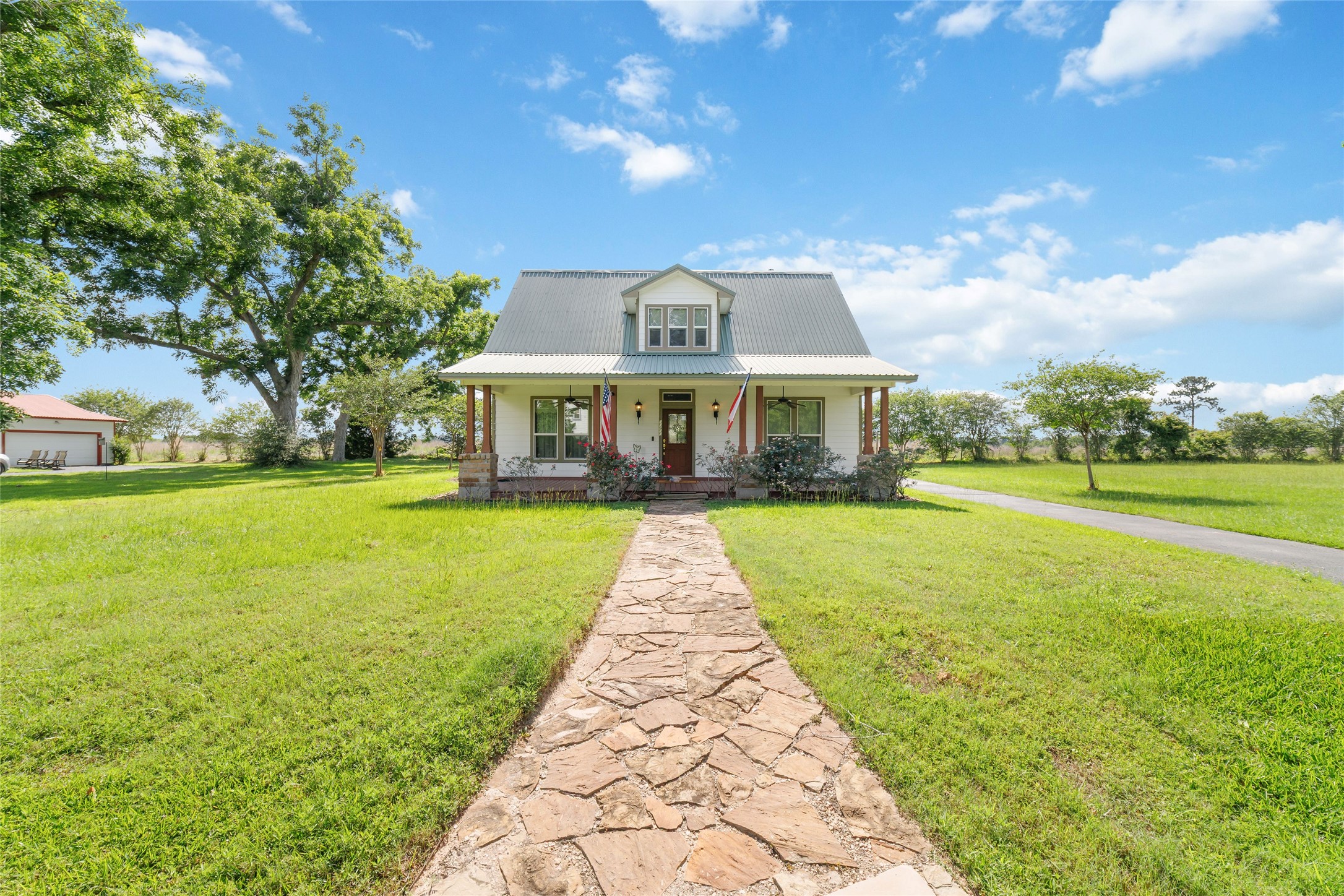 26631 Decker Prairie-Rosehill Road Magnolia, TX 77355 - Photo 9 of 20 a view of house with a garden