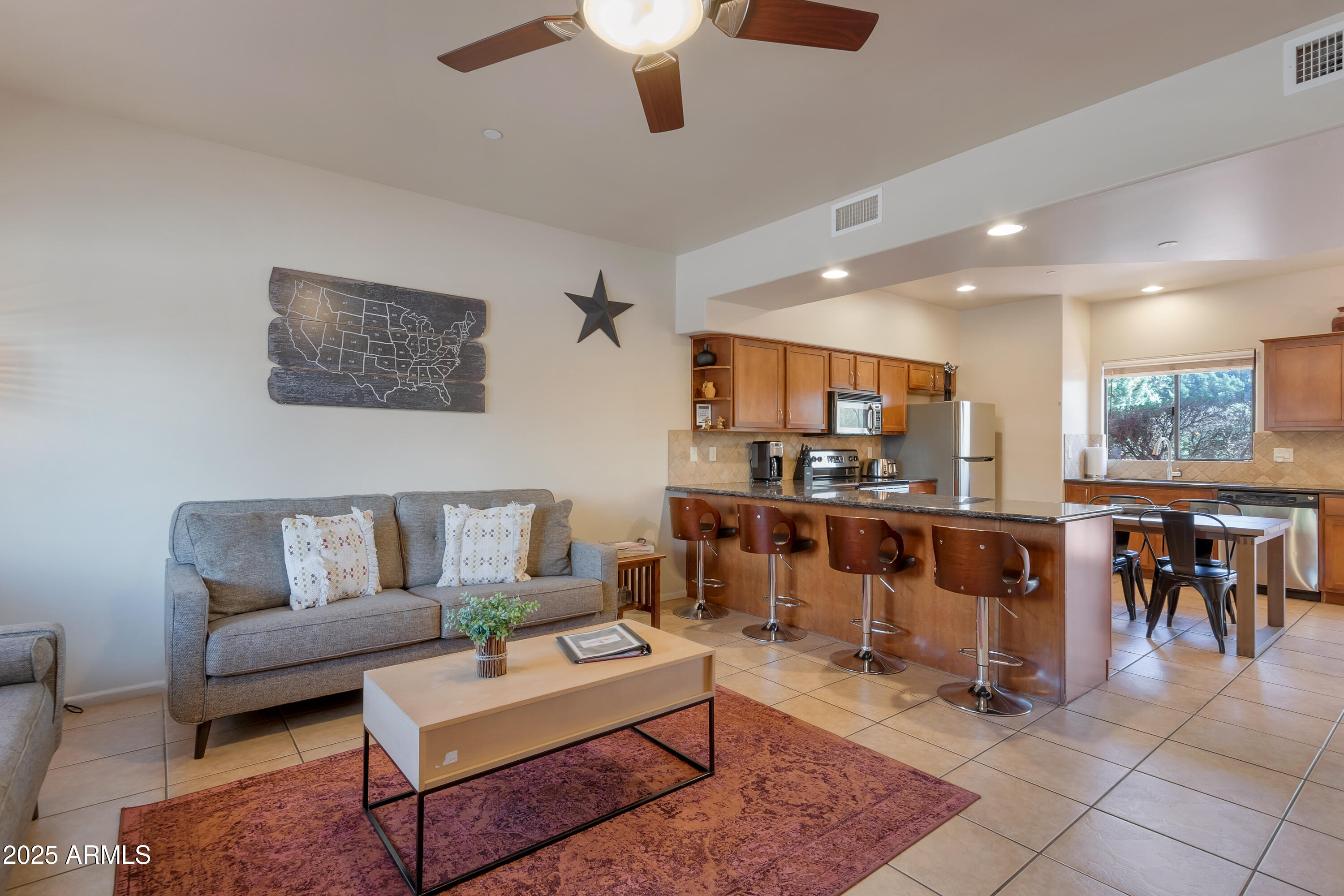 45 Canyon Diablo Road, Unit 4 Sedona, AZ 86351 - Photo 4 of 23 a living room with furniture and a table