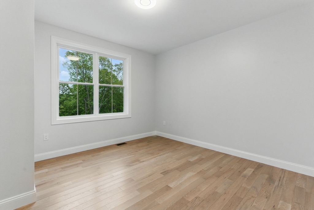 835 West Street Ludlow, MA 01056 - Photo 17 of 42 an empty room with a window