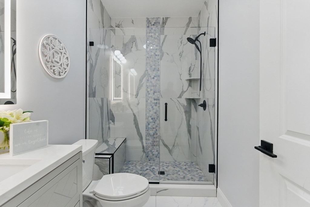 835 West Street Ludlow, MA 01056 - Photo 20 of 42 a bathroom with a toilet sink and shower