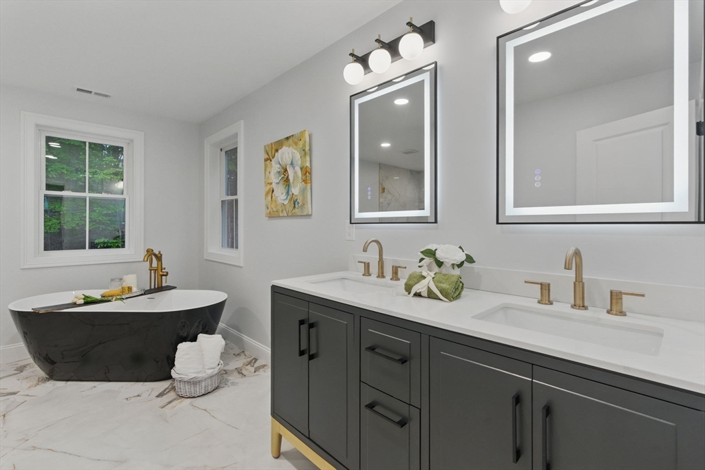 835 West Street Ludlow, MA 01056 - Photo 26 of 42 a bathroom with a sink and a mirror