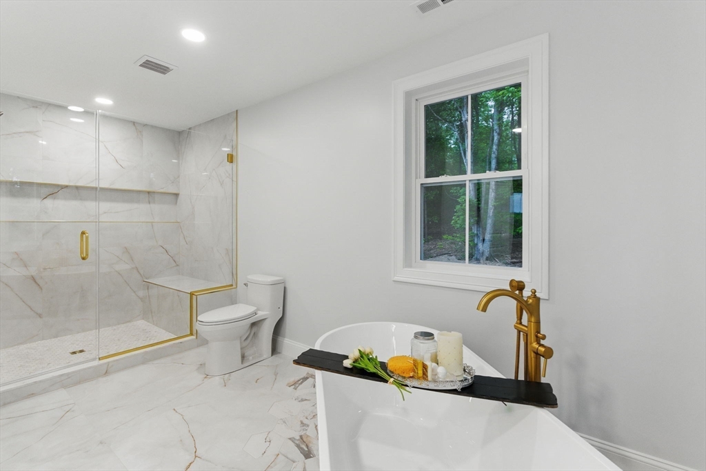 835 West Street Ludlow, MA 01056 - Photo 28 of 42 a bathroom with a sink and a tub