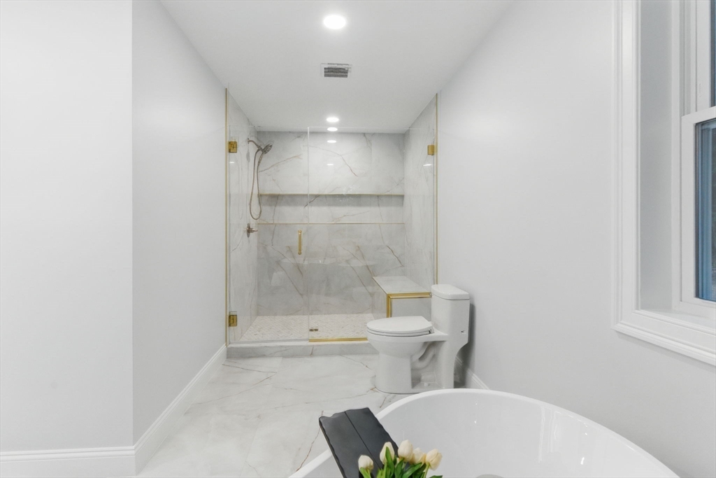 835 West Street Ludlow, MA 01056 - Photo 30 of 42 a bathroom with a toilet and a shower