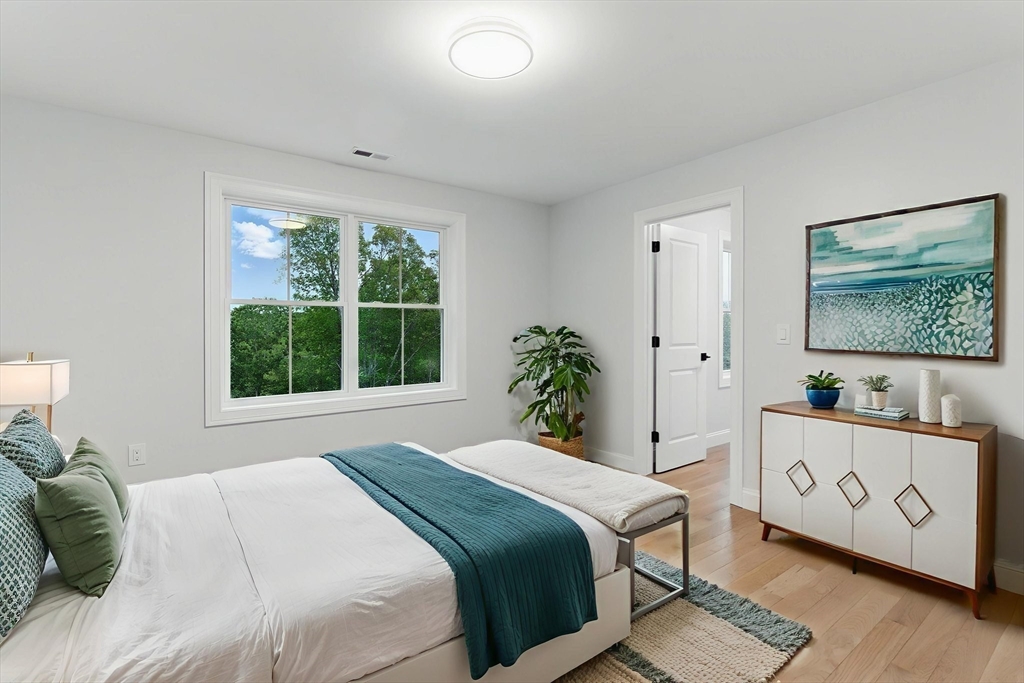 835 West Street Ludlow, MA 01056 - Photo 31 of 42 a bedroom with a bed and a window