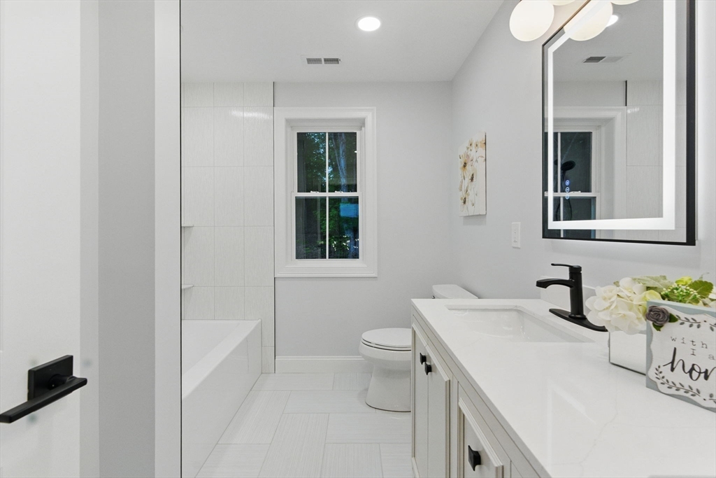 835 West Street Ludlow, MA 01056 - Photo 34 of 42 a bathroom with a sink toilet and shower