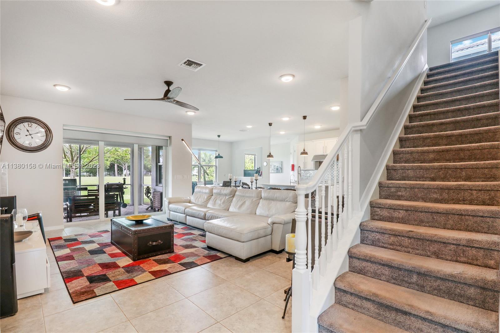1348 Silk Oak Drive Hollywood, FL 33021 - Photo 11 of 33 a living room with furniture and a large window