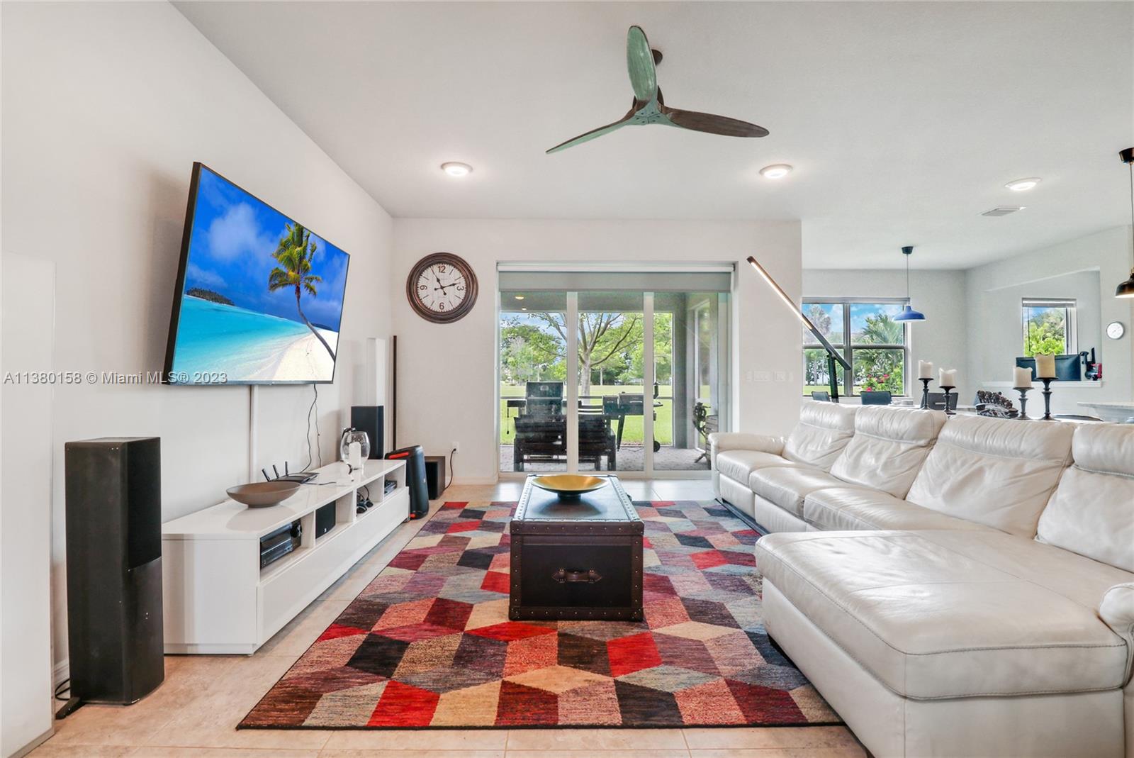 1348 Silk Oak Drive Hollywood, FL 33021 - Photo 12 of 33 a living room with furniture and a fireplace
