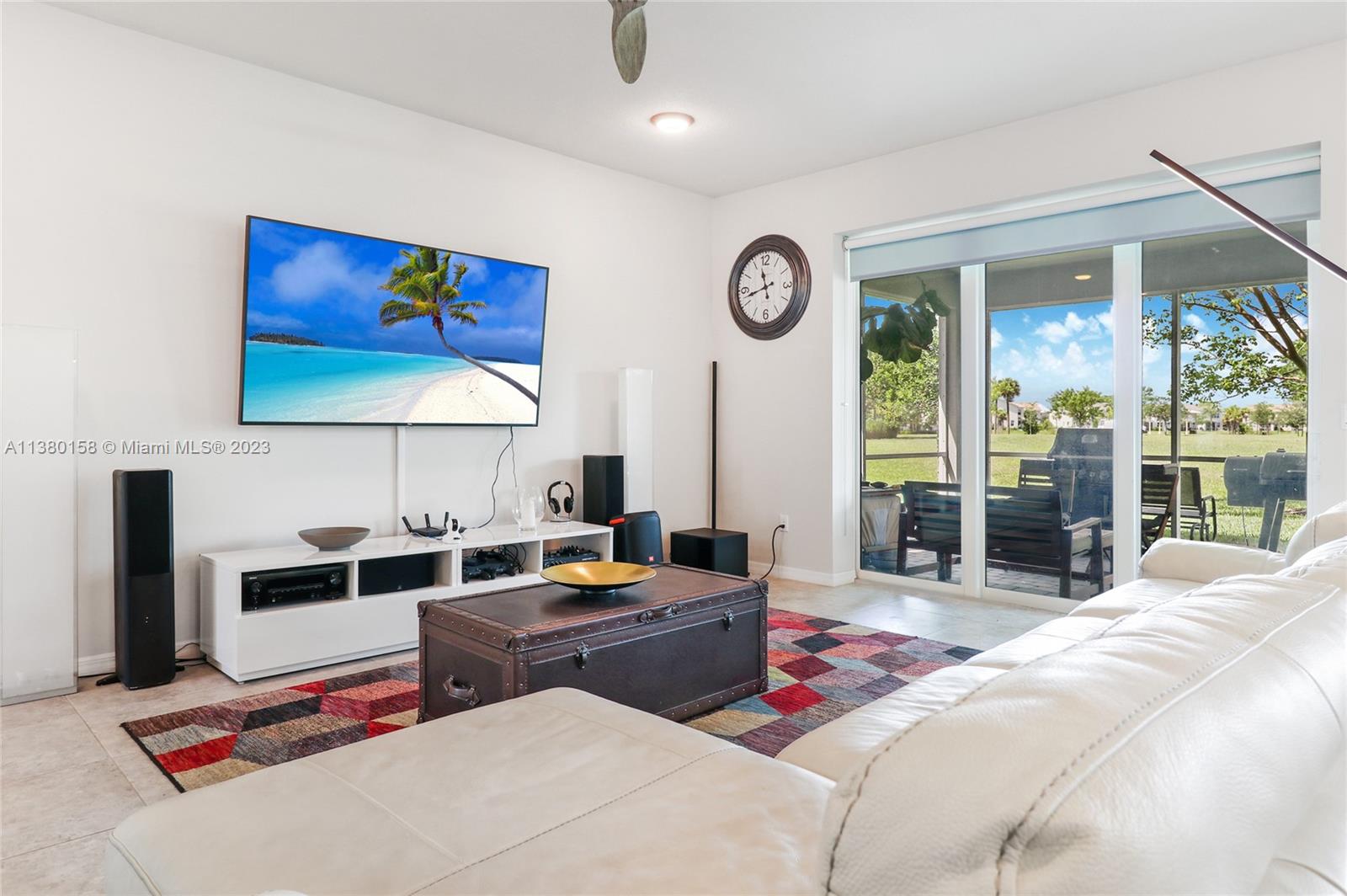 1348 Silk Oak Drive Hollywood, FL 33021 - Photo 19 of 33 a bedroom with a bed and a large window