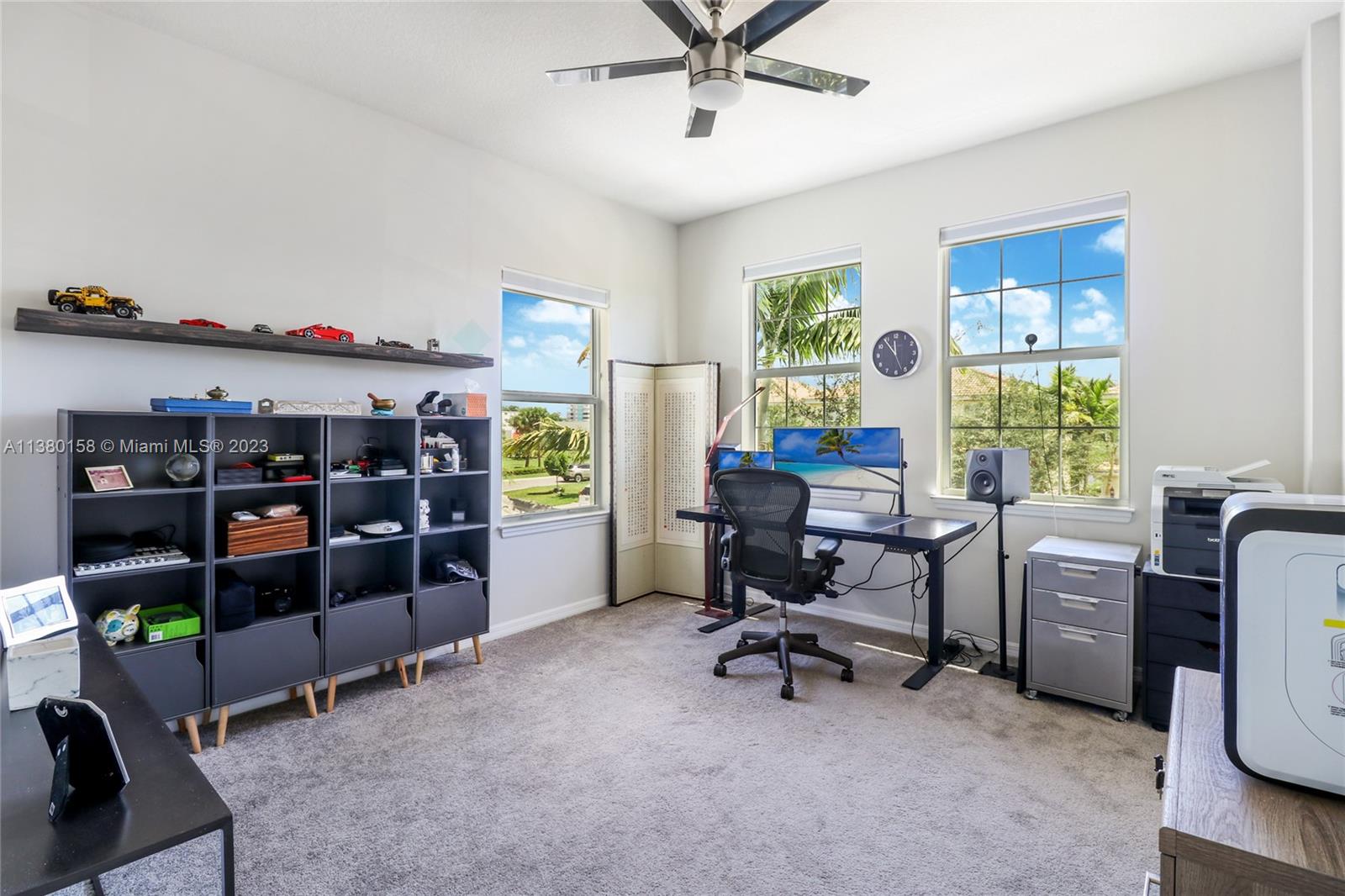 1348 Silk Oak Drive Hollywood, FL 33021 - Photo 22 of 33 a view of a workspace with furniture and a window