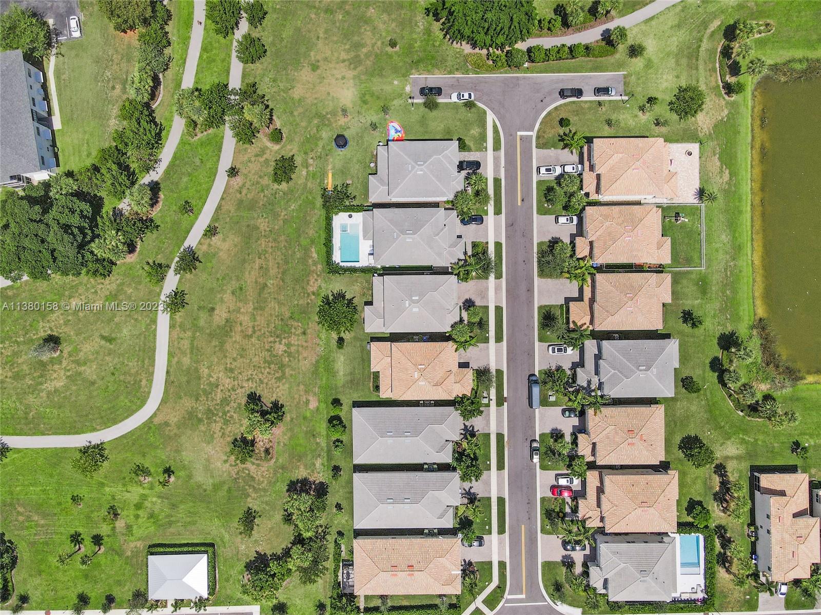 1348 Silk Oak Drive Hollywood, FL 33021 - Photo 4 of 33 an aerial view of a residential apartment building with outdoor space and parking
