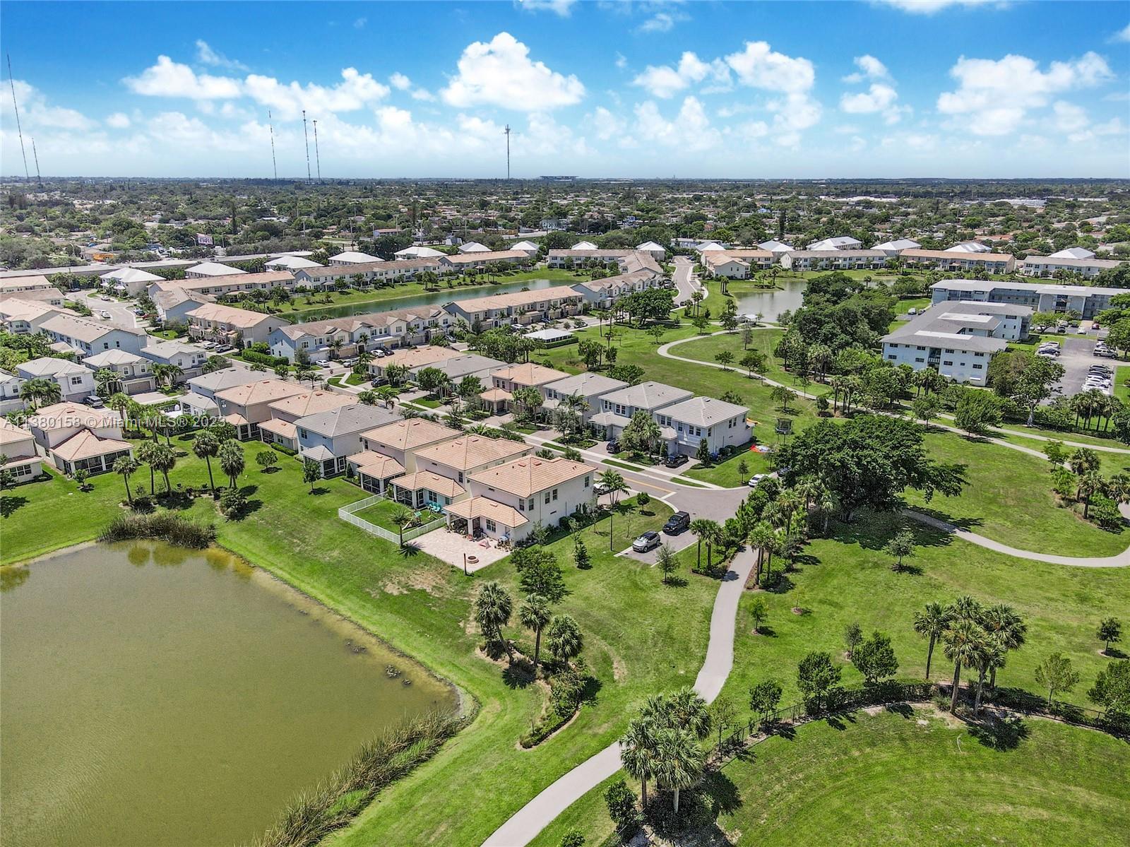 1348 Silk Oak Drive Hollywood, FL 33021 - Photo 8 of 33 an aerial view of a houses with a yard