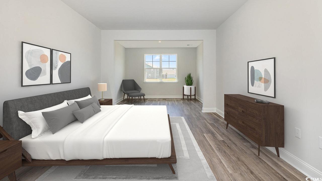 3241 Moss Bridge Lane Myrtle Beach, SC 29579 - Photo 5 of 15 Bedroom featuring baseboards and wood finished floors