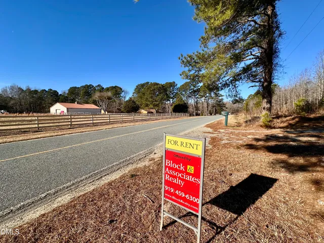 a bathroom with a sink a vanity and a mirror