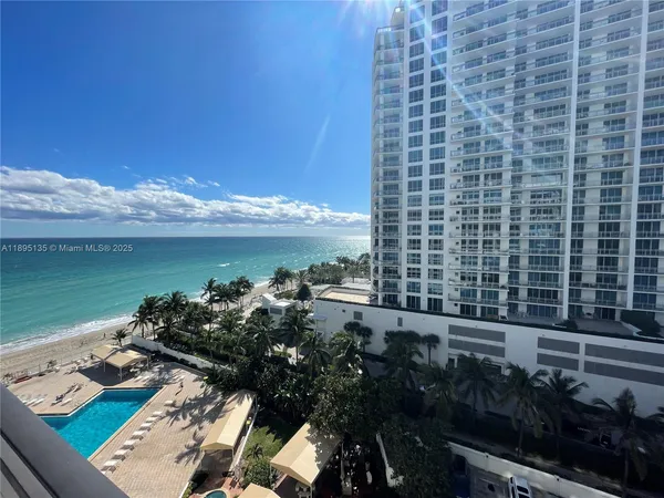 a view of a terrace with sitting area