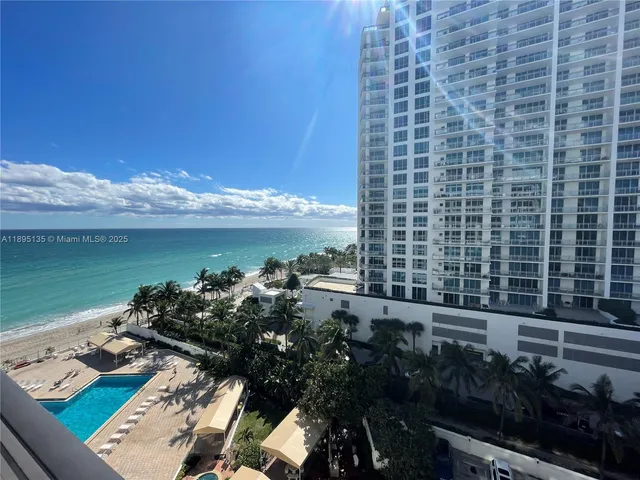 a view of a terrace with sitting area