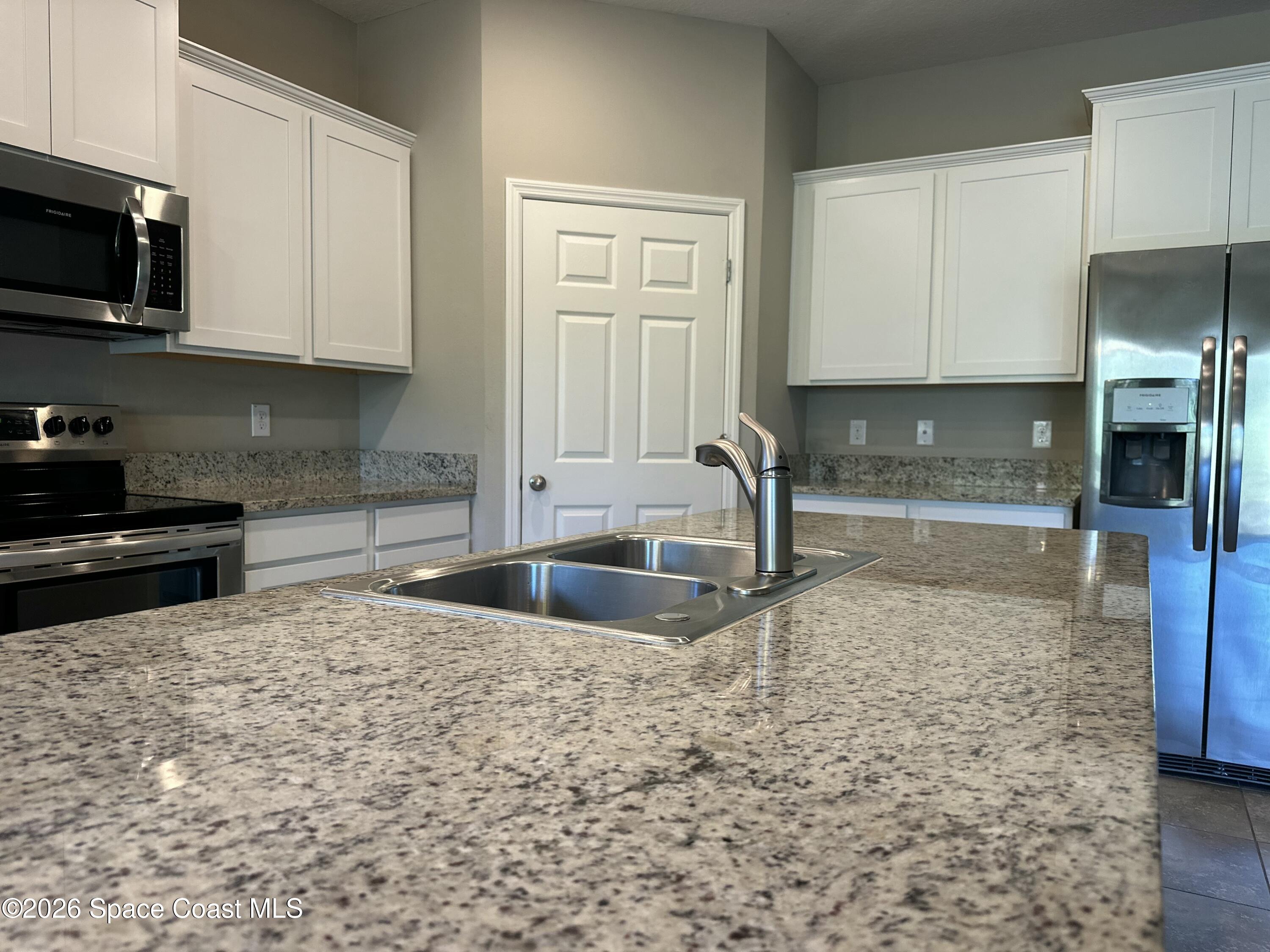 714 Old Country Rd S East Palm Bay, FL 32909 - Photo 2 of 13 Kitchen