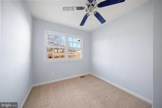a bathroom with a sink double vanity granite tub and shower
