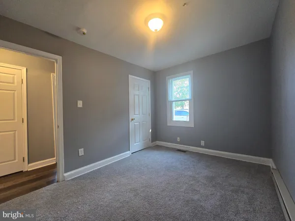 a view of a refrigerator in kitchen