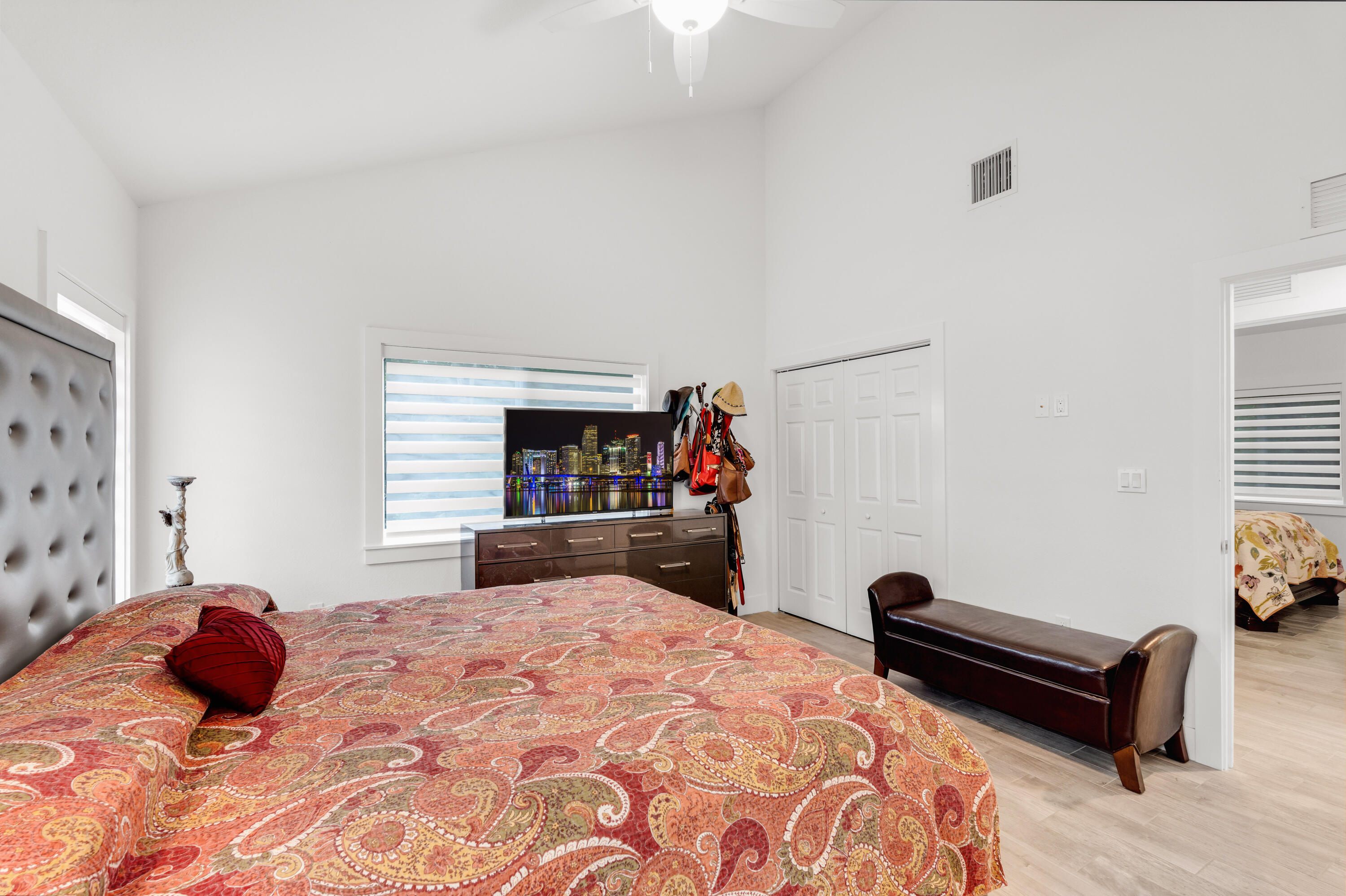 1023 Valencia Road Key Largo, FL 33037 - Photo 28 of 32 a bedroom with a bed and a couch