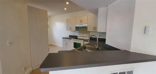 a kitchen with a sink