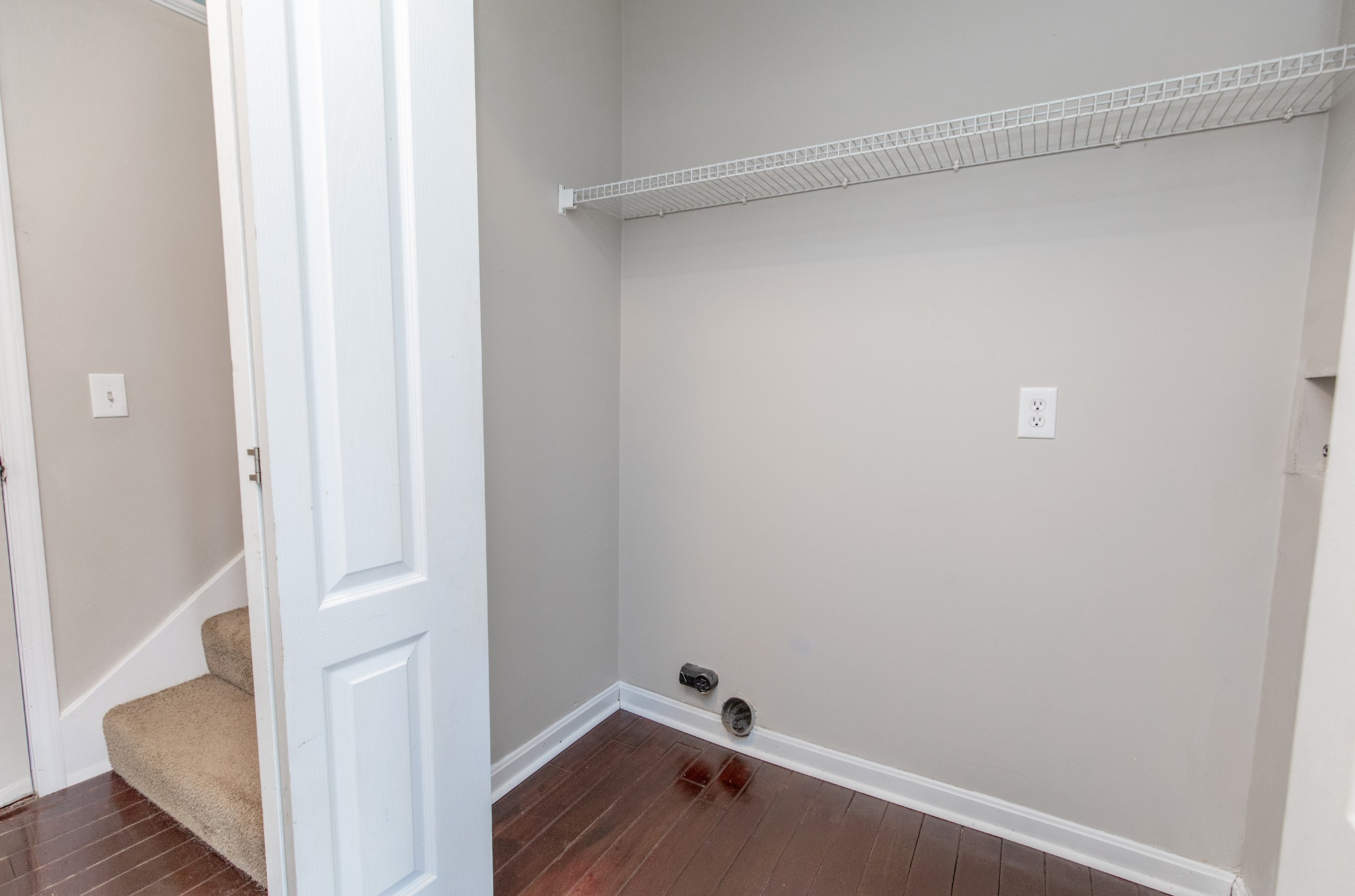 443 Clearview Road Cottontown, TN 37048 - Photo 12 of 21 a room with a walk in closet and wooden floor