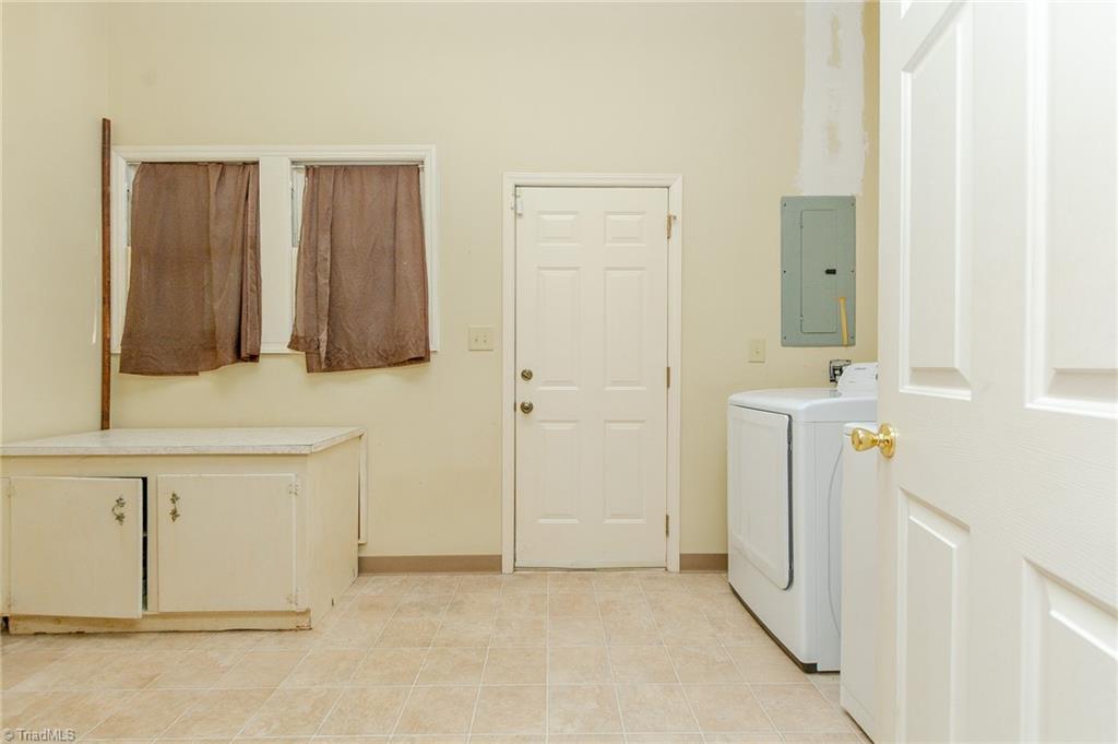 255 Lakeview Church Road Linwood, NC 27299 - Photo 24 of 30 Laundry room attached to Flex space could easily become a 3rd bathroom