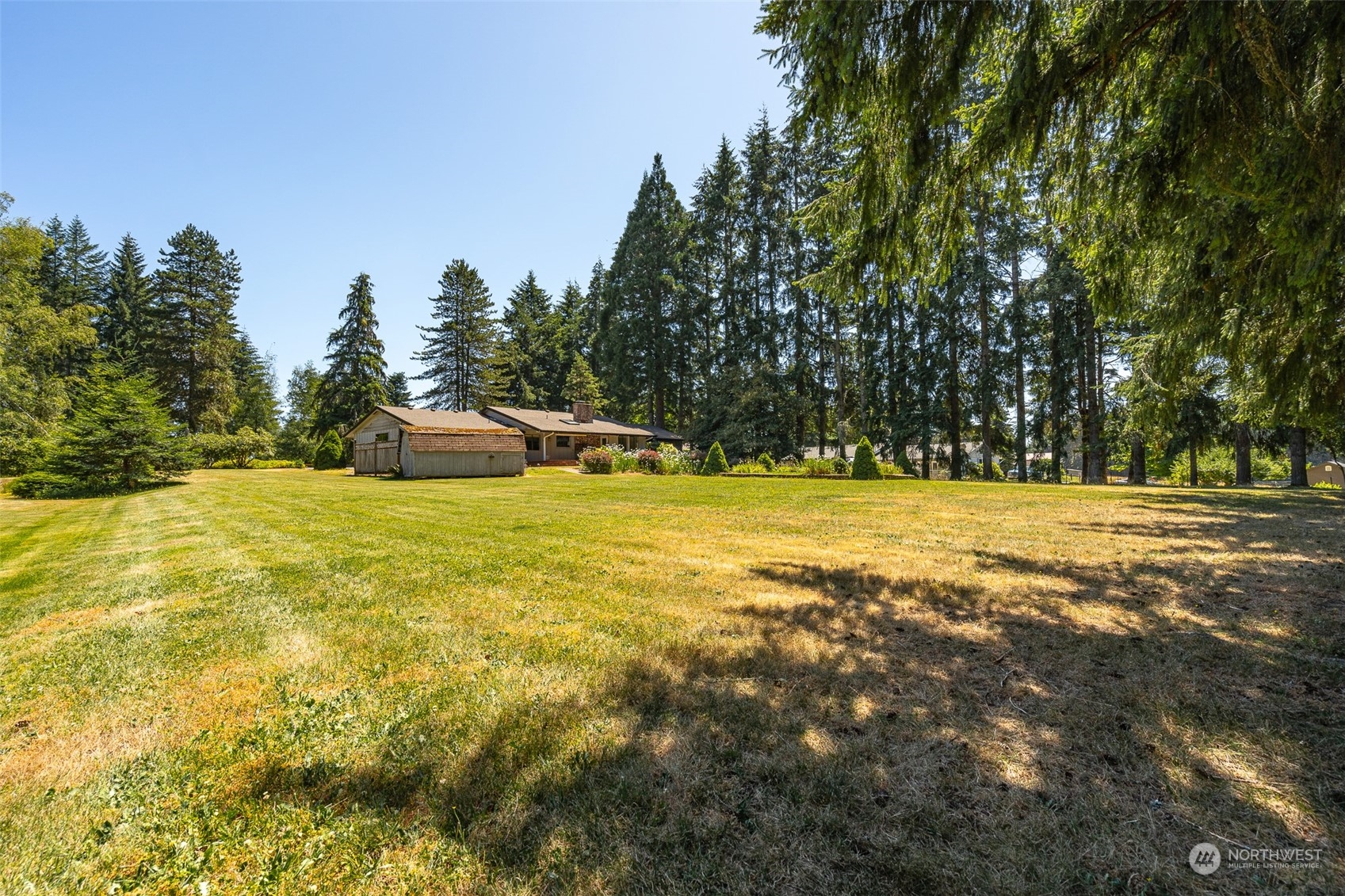 273 Brockway Road Chehalis, WA 98532 - Photo 12 of 39 a view of swimming pool with an outdoor space and seating area