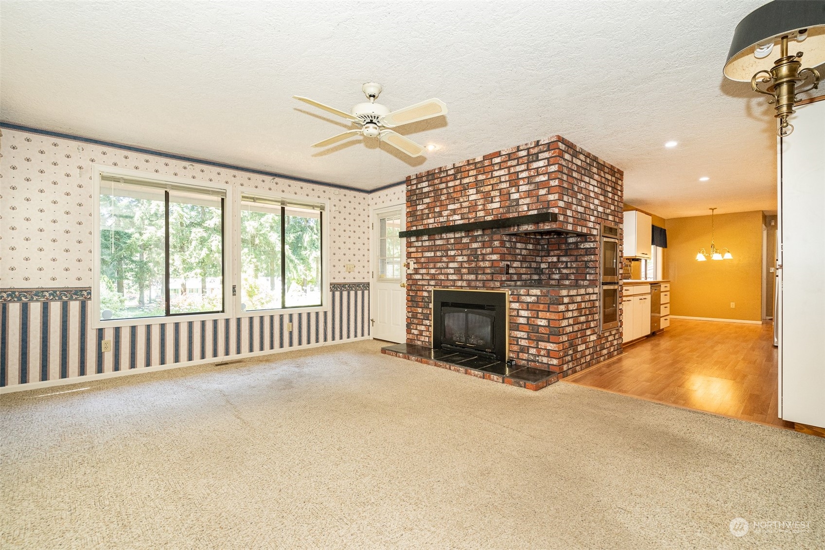 273 Brockway Road Chehalis, WA 98532 - Photo 26 of 39 a view of an empty room with a fireplace and a window