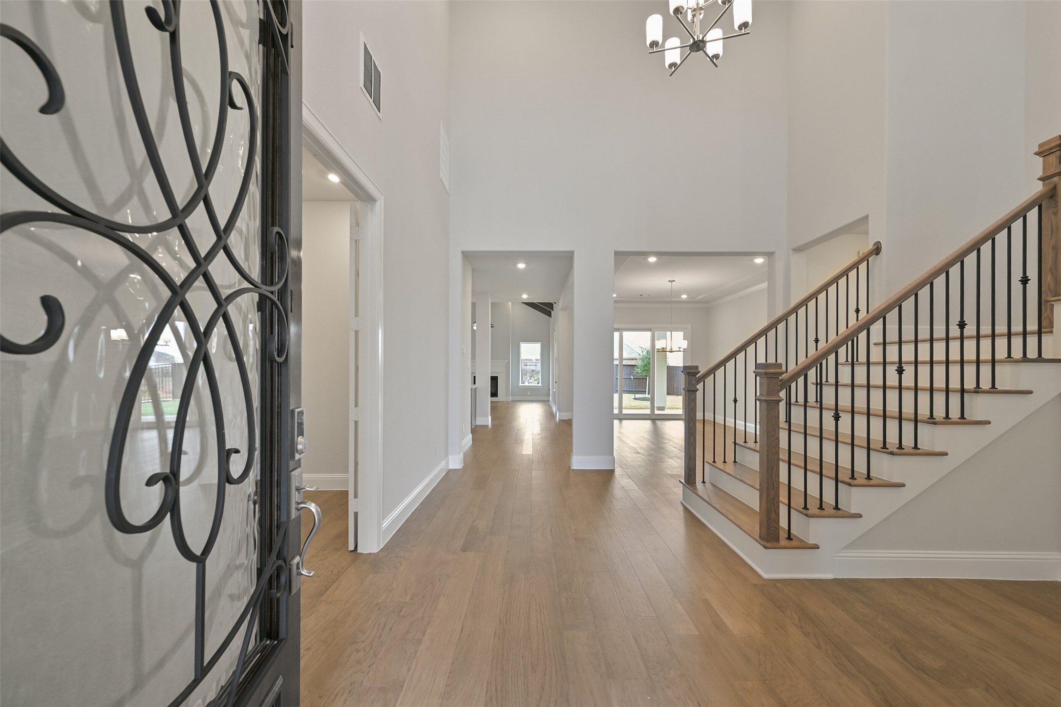 5215 Conifer Court Manvel, TX 77578 - Photo 2 of 49 a view of entryway and hall with wooden floor