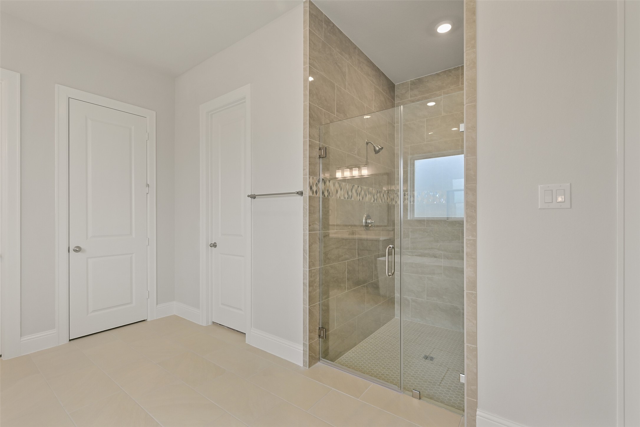 5215 Conifer Court Manvel, TX 77578 - Photo 22 of 49 a bathroom with a shower and a sink