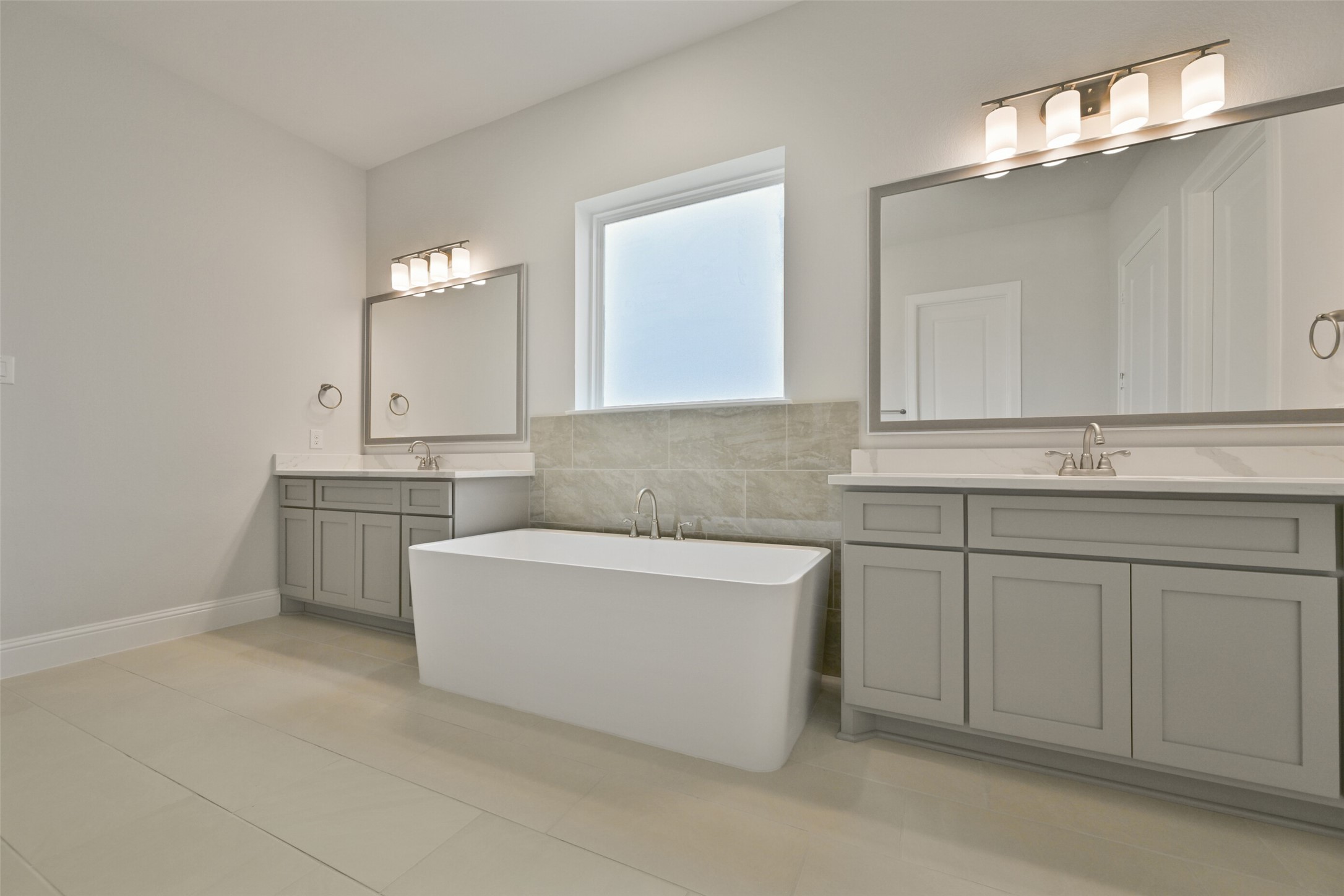 5215 Conifer Court Manvel, TX 77578 - Photo 23 of 49 a bathroom with a sink vanity and mirror