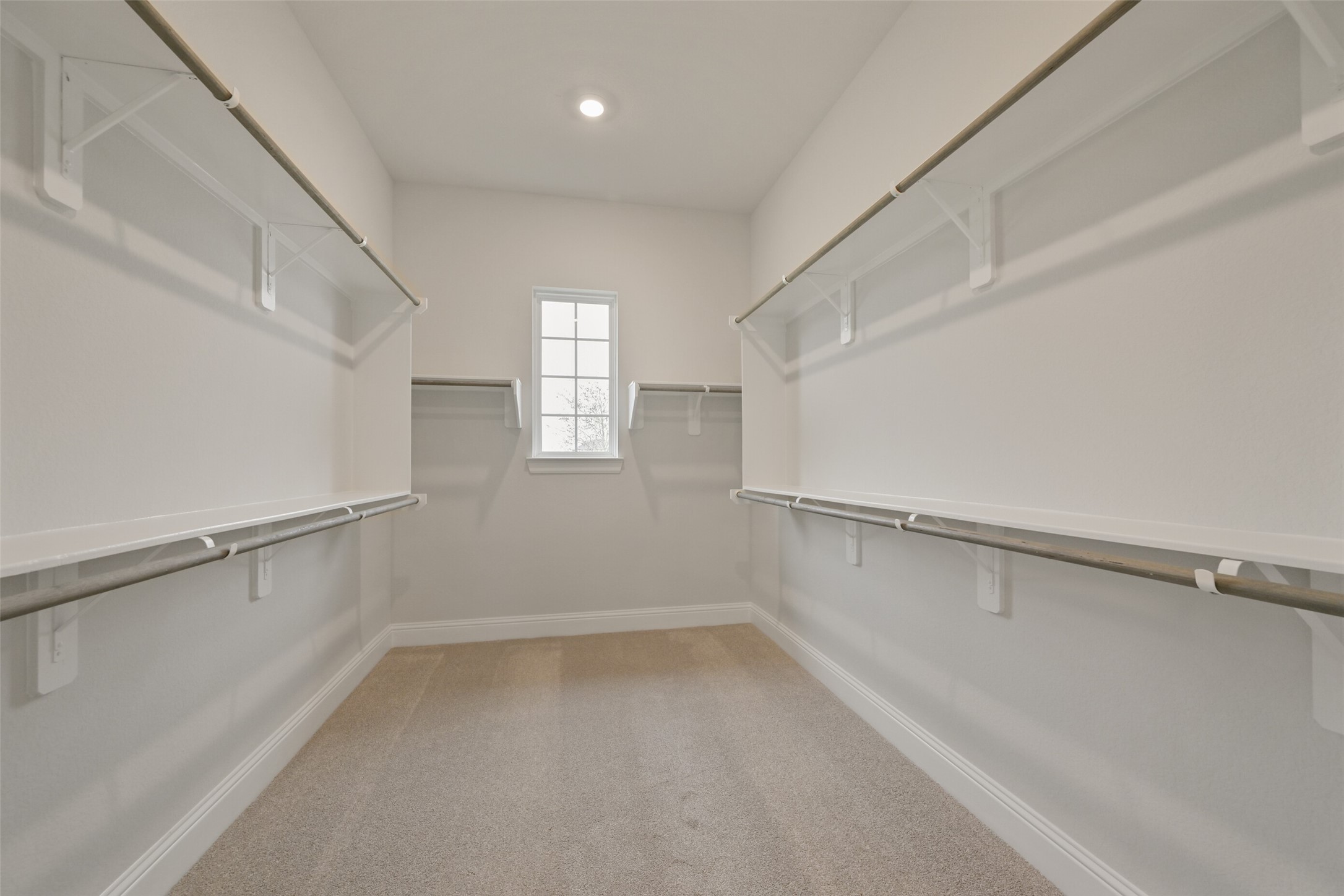 5215 Conifer Court Manvel, TX 77578 - Photo 24 of 49 a view of a room with rack on the wall